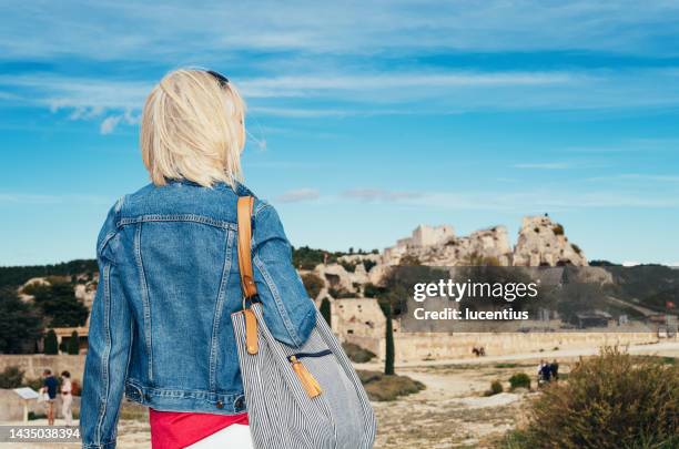 les baux de provence, france - denim jacket from behind stock pictures, royalty-free photos & images