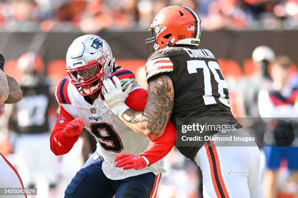 Matthew Judon of the New England Patriots rushes against Jack Conklin of the Cleveland Browns during the second half at FirstEnergy Stadium on...