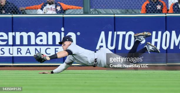 New York Yankees center fielder Aaron Judge makes the catch on ball hit by Houston Astros third baseman Alex Bregman in first inning in game 1 of the...