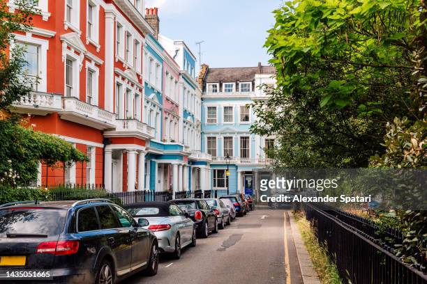 multi-colored vibrant houses in primrose hill neighbourhood, london, uk - district stock pictures, royalty-free photos & images