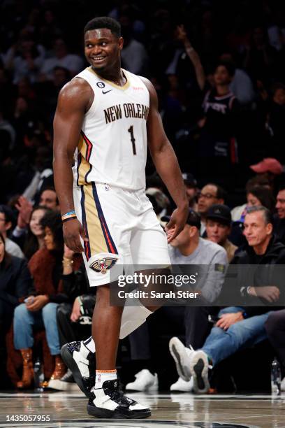 Zion Williamson of the New Orleans Pelicans looks on during the first half against the Brooklyn Nets at Barclays Center on October 19, 2022 in the...