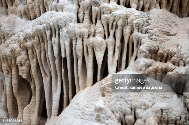 close-up of stalactites stone information - estalactite imagens e fotografias de stock