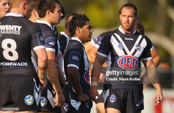 Chris Sandow of the Wentworthville Magpies stands dejected with his team mates after a Vulcans try during the round nine NSW Cup match between the...