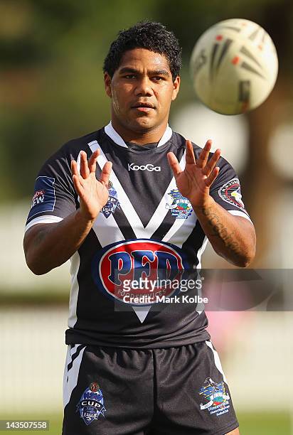 Chris Sandow of the Wentworthville Magpies catches a pass during the warm-up before the round nine NSW Cup match between the Wentworthville Magpies...
