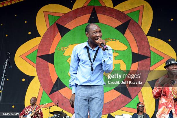 Seun Kuti performs with his band Egypt 80 during the 2012 New Orleans Jazz & Heritage Festival at the Fair Grounds Race Course on April 27, 2012 in...