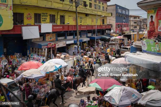 The police patrol the streets of Makola market to ensure peace and order during a protest by the Ghana Union of Traders Association on October 20 in...