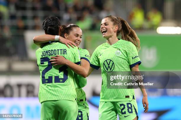 Ewa Pajor of VfL Wolfsburg celebrates with team mates Sveindis Jonsdottir and Tabea Wassmuth after scoring their sides second goal during the UEFA...