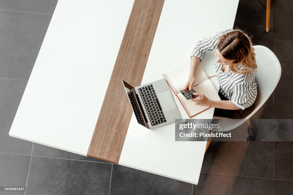 High Angle Shot of Businesswoman Working