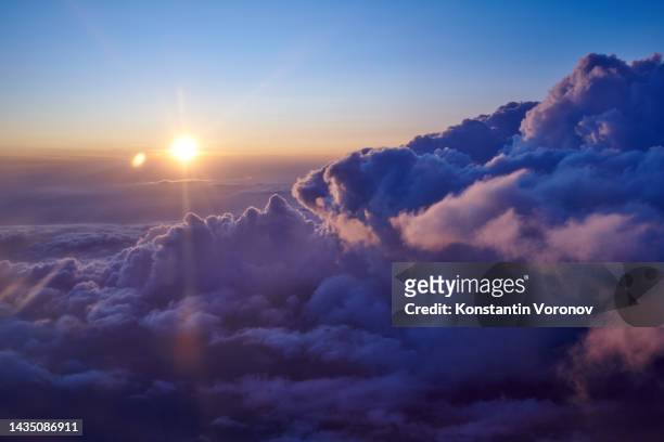 sun and clouds. beautiful dramatic sky - aircraft point of view stock pictures, royalty-free photos & images