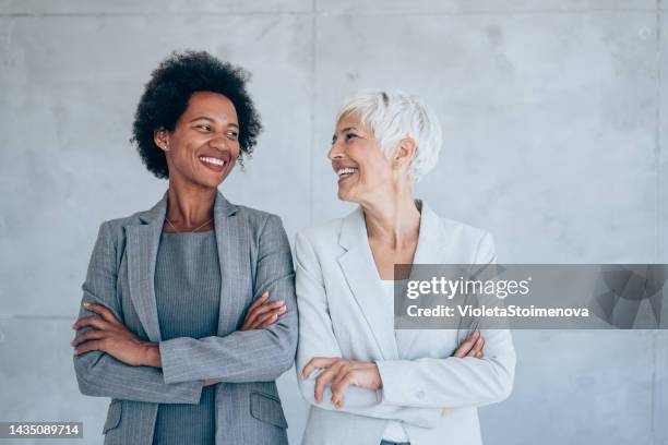 successful female business team. - side by side stock pictures, royalty-free photos & images
