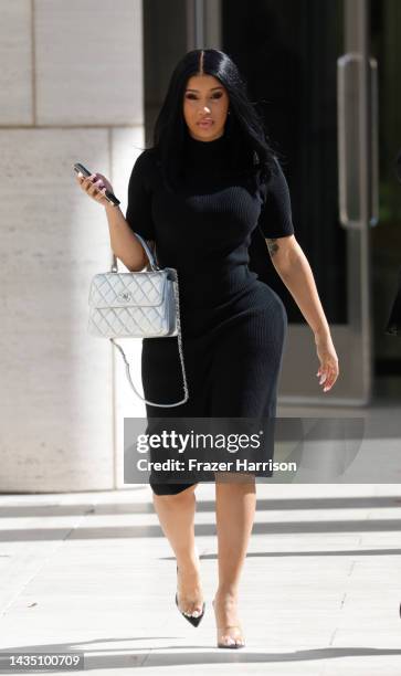 Cardi B is seen departing the Ronald Reagan Federal Building and U.S. Courthouse on October 20, 2022 in Santa Ana, California. Cardi B is being sued...