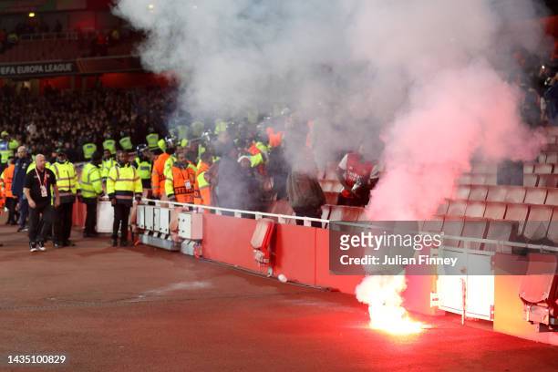 Flare is seen following the UEFA Europa League group A match between Arsenal FC and PSV Eindhoven at Emirates Stadium on October 20, 2022 in London,...