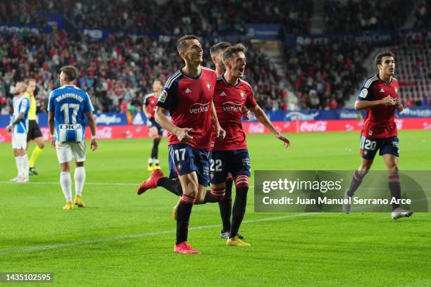 Ante Budimir of Osasuna celebrates with teammate Aimar Oroz after scoring their side's first goal during the LaLiga Santander match between CA...