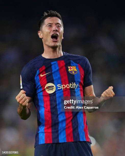 Robert Lewandowski of FC Barcelona celebrates after scoring their sides second goal during the LaLiga Santander match between FC Barcelona and...
