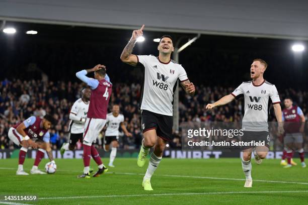 Aleksandar Mitrovic of Fulham celebrates after scoring their sides second goal from the penalty spot during the Premier League match between Fulham...