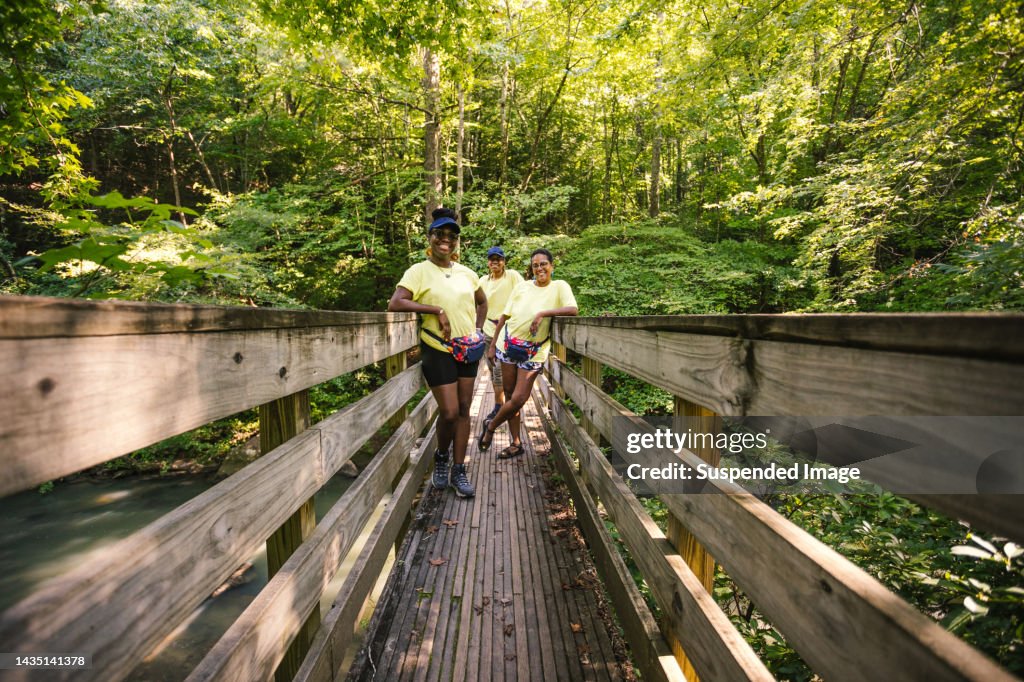 Nature Friends Group Of Friends On A Bridge Enjoying Nature High-Res Stock Photo ...
