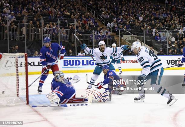 Logan Couture of the San Jose Sharks scores a first period goal against Igor Shesterkin of the New York Rangers at Madison Square Garden on October...