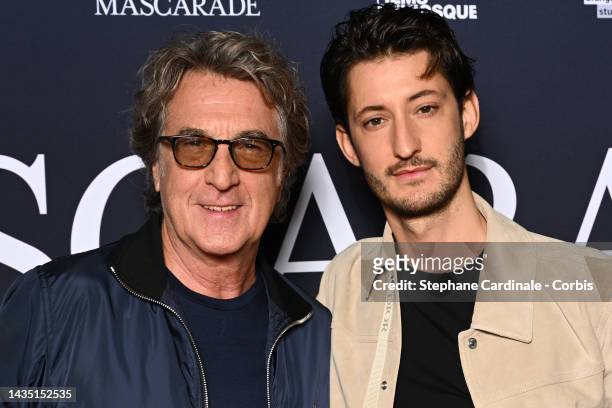 Francois Cluzet and Pierre Niney attend the "Mascarade" premiere at Pathe Wepler on October 20, 2022 in Paris, France.