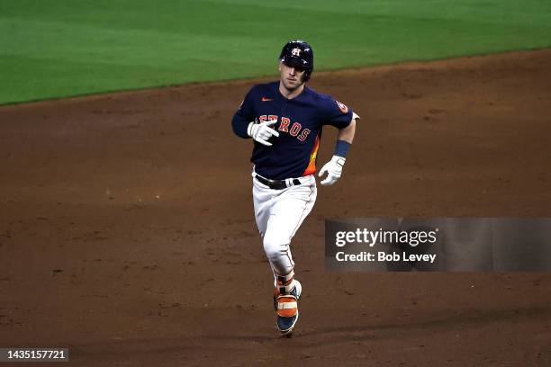 Alex Bregman of the Houston Astros jogs around the bases after his three-run home run against the New York Yankees during the third inning in game...