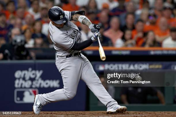 Gleyber Torres of the New York Yankees hits an RBI single against the Houston Astros during the fourth inning in game two of the American League...