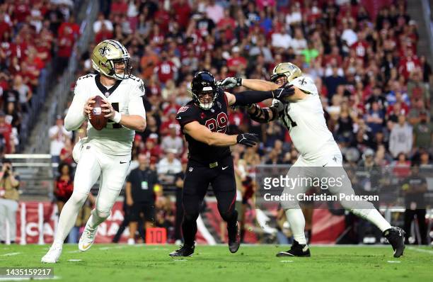 Quarterback Andy Dalton of the New Orleans Saints looks to pass during the 1st quarter of the game against the Arizona Cardinals at State Farm...