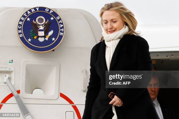 Secretary of State Hillary Clinton arrives to attend talks in Paris on April 19 as part of international efforts to end the violence in Syria. A...