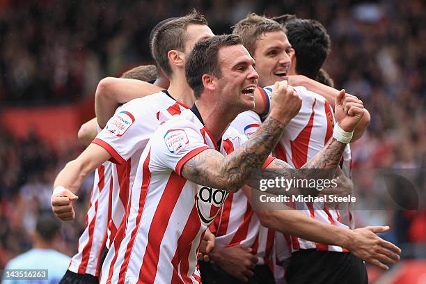 Daniel Fox leads the Southampton celebrations after his sides third goal scored by Jos Hooiveld during the npower Championship match between...