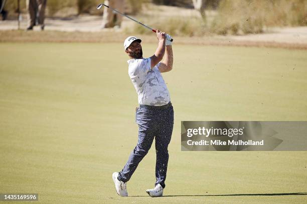 Jon Rahm of Spain hits an approach shot on the 17th hole during the first round of the CJ Cup at Congaree Golf Club on October 20, 2022 in Ridgeland,...