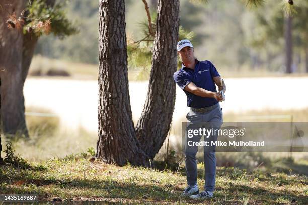 Justin Thomas of the United States hits out of the rough on the 17th hole during the first round of the CJ Cup at Congaree Golf Club on October 20,...