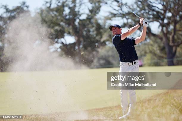 Rory McIlroy of Northern Ireland hits an approach shot on the 17th hole during the first round of the CJ Cup at Congaree Golf Club on October 20,...