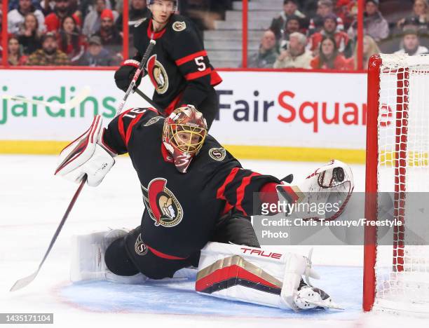 Anton Forsberg of the Ottawa Senators makes a glove save in the third period of the game against the Washington Capitals at Canadian Tire Centre on...