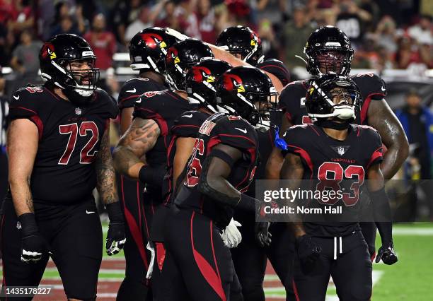 Greg Dortch of the Arizona Cardinals celebrates with teammates after scoring a touchdown during the 3rd quarter of the game against the New Orleans...