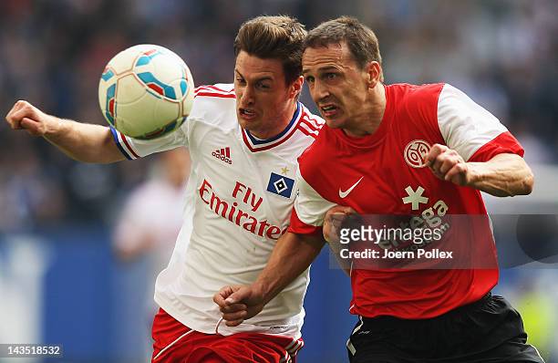 Jacopo Sala of Hamburg and Zdenek Pospech of Mainz battle for the ball during the Bundesliga match between Hamburger SV and FSV Mainz 05 at Imtech...
