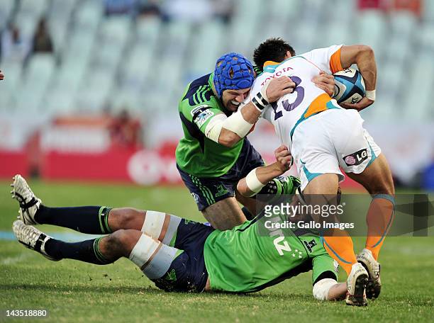James Haskell of the Highlanders and Robert Ebersohn of the Cheetahs compete during the 2012 Super Rugby match between Toyota Cheetahs and...