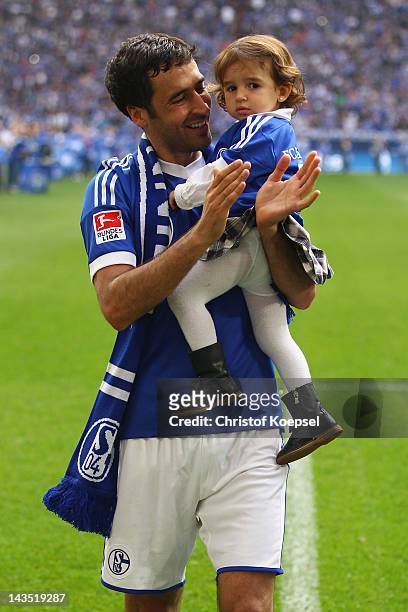 Raul Gonzalez of Schalke and his daughter Maria Gonzalez says farewell to the fans after winning 4-0 the Bundesliga match between FC Schalke 04 and...