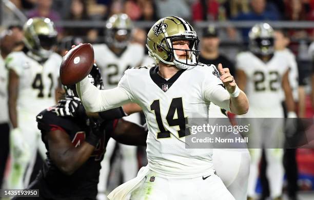 Quarterback Andy Dalton of the New Orleans Saints passes during the 4th quarter of the game against the Arizona Cardinals at State Farm Stadium on...