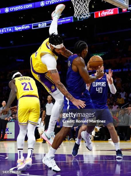 Anthony Davis of the Los Angeles Lakers fouls Kawhi Leonard of the LA Clippers in the third quarter at Crypto.com Arena on October 20, 2022 in Los...
