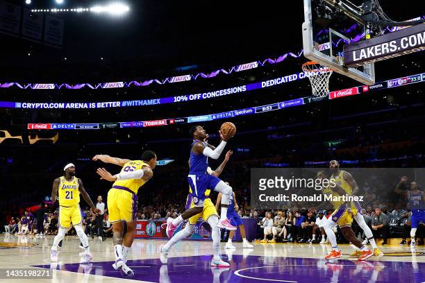 John Wall of the LA Clippers takes a shot against the Los Angeles Lakers in the third quarter at Crypto.com Arena on October 20, 2022 in Los Angeles,...
