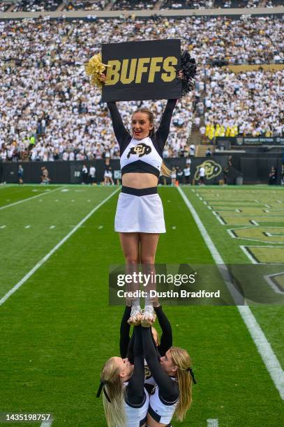 Members of the Colorado Buffaloes cheerleading team perform during a game between the Colorado Buffaloes and the California Golden Bears at Folsom...