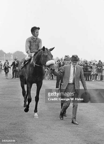 Jockey Geoff Lewis on the Queen's racehorse Magna Carta, after winning the Ascot Stakes at the Royal Ascot meeting, 16th June 1970.