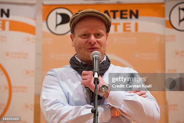 Bernd Schloemer, new elected Chairman of the Piratenpartei , speaks to the press at the federal congress of the Piratenpartei on April 28, 2012 in...