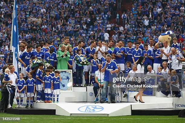 The team of Schalke celebrate after winning 4-0 the Bundesliga match between FC Schalke 04 and Hertha BSC Berlin at Veltins Arena on April 28, 2012...