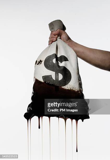 oil money - money bag white background stock pictures, royalty-free photos & images