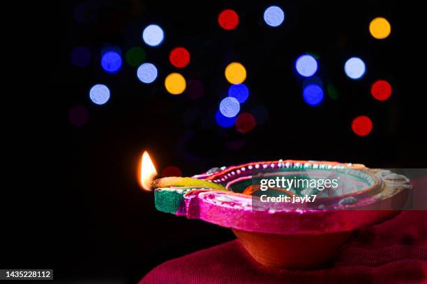 diwali lights - diya oil lamp fotografías e imágenes de stock