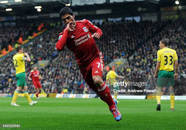 Luis Suarez of Liverpool celebrates after scoring the second goal during the Barclays Premier League match between Norwich City and Liverpool at...