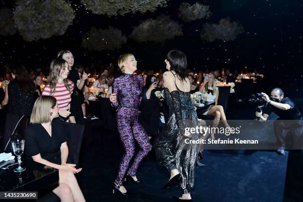 Maggie Rogers and Karen O dance as Yeah Yeah Yeahs perform during the CHANEL dinner to celebrate the 1932 High Jewelry Collection on October 20, 2022...