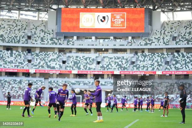 Sanfrecce Hiroshima players warm up during the official practice and press conference ahead of J.LEAGUE YBC Levain Cup final between Cerezo Osaka and...