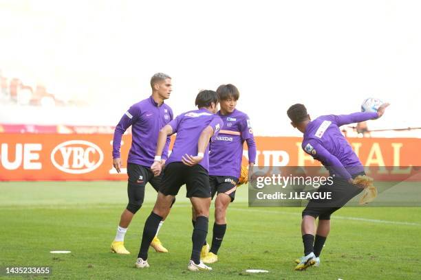 Sanfrecce Hiroshima players warm up during the official practice and press conference ahead of J.LEAGUE YBC Levain Cup final between Cerezo Osaka and...