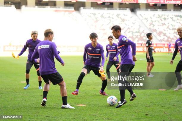 Takumu KAWAMURA of Sanfrecce Hiroshima warms up during the official practice and press conference ahead of J.LEAGUE YBC Levain Cup final between...