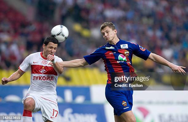 Tomas Necid of PFC CSKA Moscow battles for the ball with Marek Suchy of FC Spartak Moscow during the Russian Football League Championship match...